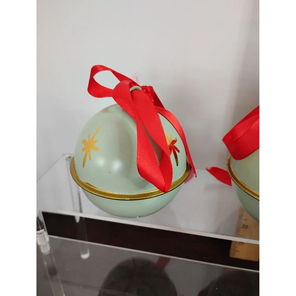 Set of 2 Mint Green Metal Jingle Bell Ornaments with Red Ribbon and Gold Stars